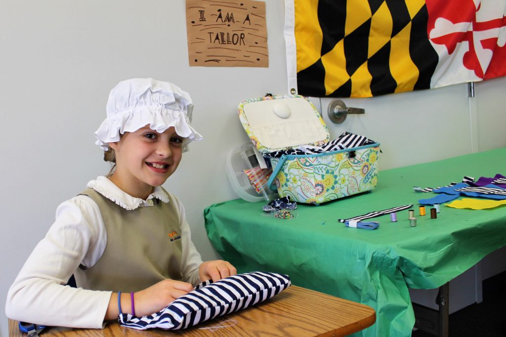 Elementary student doing a dramatic presentation on Maryland history